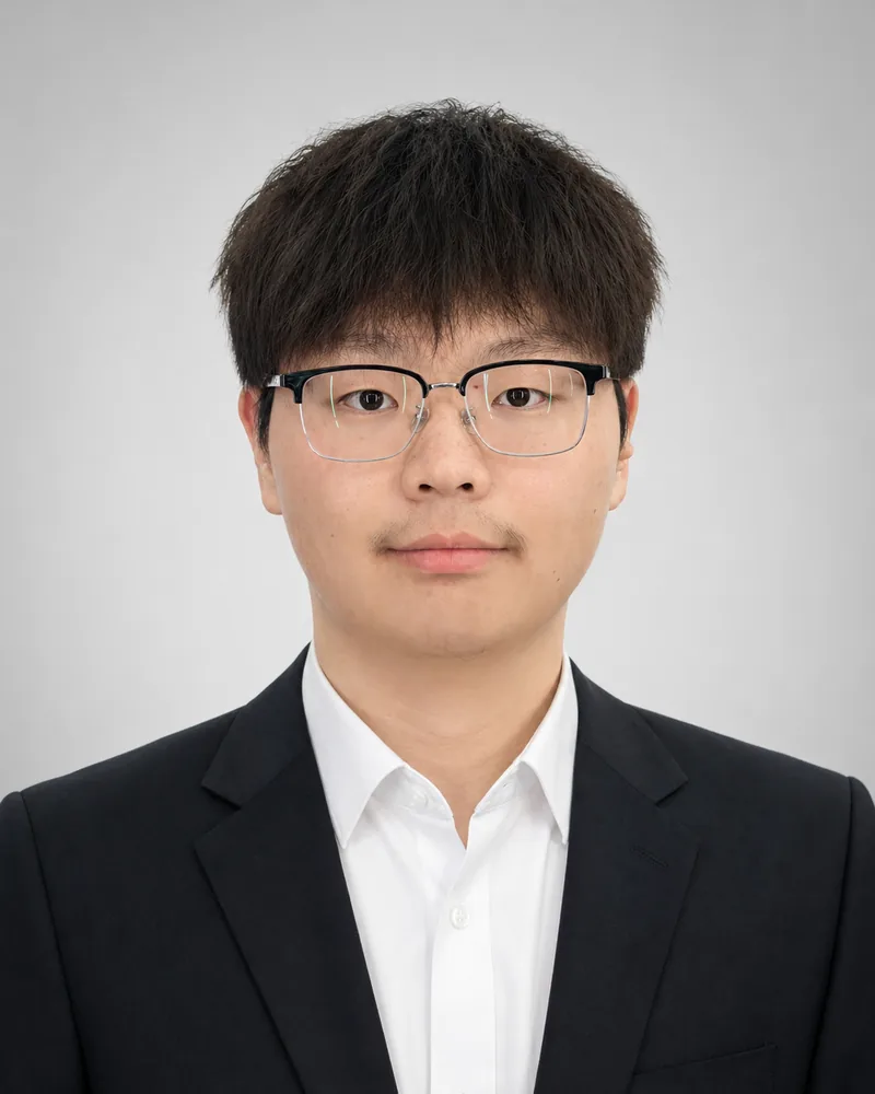 Professional portrait of Jianfei Xu.